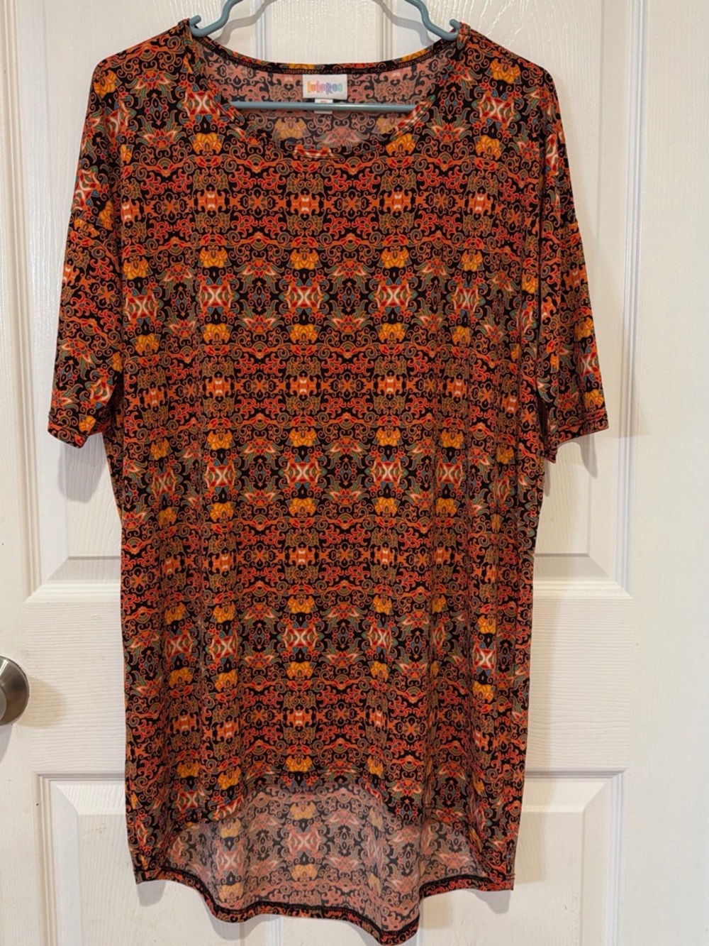 LuLaRoe IRMA Size XS-Orange Black Swirl Print Top